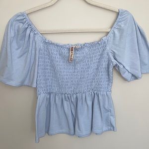 Light blue, off the shoulder top, perfect for the spring.